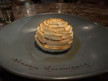 And our delicious Bombe Alaska . . . set on fire with liquor!