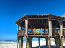 Some restaurants have beach patios for dining that offer a nice beach view, this one is Pineapple Willy's 