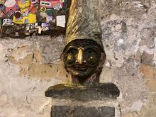 Pulcinella statue - note the light and shiny nose!