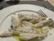 Spigola cooked in a salt crust, after waiter broke the crust and filleted the fish