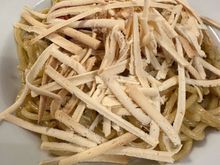 Spaghetti alle carrettiera, with pistachio pesto, cherry tomatoes, capers, and topped with the long strips of baked ricotta that you see on the top of the pasta....very good but not repeatable.