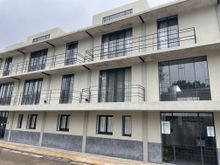 The front of our building which is quite modern.  Previously it was a pediatric clinic, not sure how long it has been apartments.  I think around 5 years?