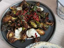Roasted brussel sprouts, coriander seeds,barberries and garlic yogurt