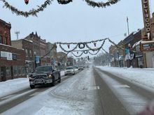 our towns xmas decorations. The 'bras' have been put up for over 75 years in a row. Does the left one look a little bigger than the right one to anyone else?