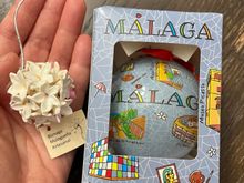 Our "official" souvenirs from our trip: a Malaga ornament and a porcelain Biznaga ornament