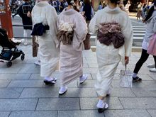 A common sight - young women dressed in traditional outfits 
