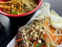 Chicken curry and blue crab papaya salad at Wat Thai Food Court
