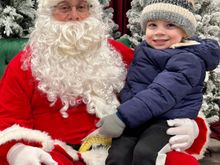 He was a little hesitant at first, but then he hopped right onto his lap. But he is not talking much so he had nothing to say to Santa when asked what he wanted for Christmas. Next year, when he’ll be almost 4, I’m sure that will be a totally different story, lol!