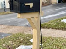 When we got home, I put Ziggy to work! Our wooden mailbox post had rotted and broken off so Ziggy cleverly figured out a way to hold it up until the new one is installed next week.