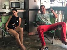 My 17 year old Cuban daughter, Delenys, and my best amigo, Maikel, sitting in our back terrace / kitchen in the morning. 