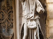 Shutterbugs could look for the square's famed wooden carvings from the Middle ages. Those portray a number of men and woman in starkly unflattering terms. The moneylenders have had their faces cut away, such as shown here @#11. St. Martin is also shown standing atop the back of a poor everyman. Symbolic, no?