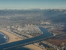 Actually, we flew on United up to Santa Barbara. Above shows our take-off. We see (I think) Playa del Rey and the Marina del Rey peninsula, maybe possibly Venice canal on the far left?