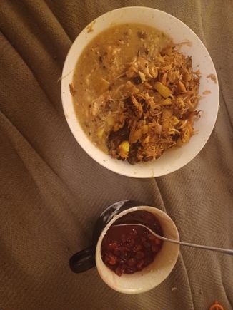 Turkey hash made with sauteed red onions and diced yukon gold. Served with homemade gravy and a quick batch of whole berry warm  cranberry sauce. I had about 1/3 of this bowl. 