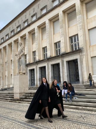 Students wearing their capes, said to be the influence for the Hogwarts students in the Harry Potter books