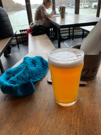 I’ve been spending the day by myself and walking the Canal St Martin. It’s windy and chilly so I stopped for a saison at a brewery to let my ears warm up. 