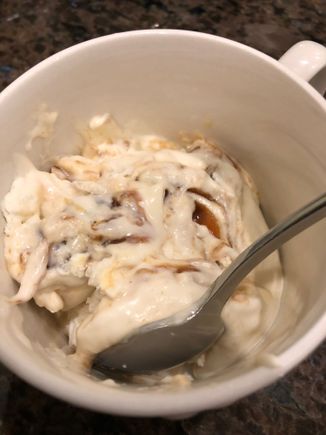Vanilla, toasted coconut and almonds and caramel ribbon ice cream.