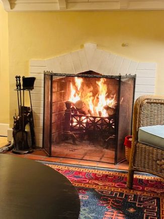 Bad decisions. We wanted a fire, but it’s too cold outside. So all of the heat is being sucked up the chimney. It’s pretty, though, and I like the crackle. 