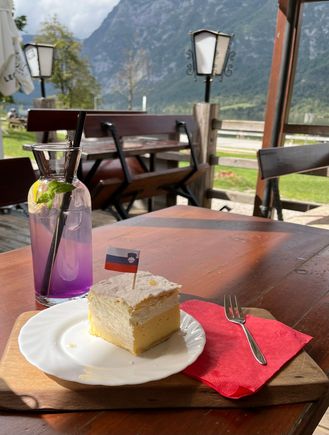 Yummy cream cake and tasty, eye appealing lavender drink