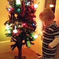 Photo from 2013 - our toddler grandchild size tree that might be getting retired this year although last year the bubble lights were still checked to make sure each was bubbling.