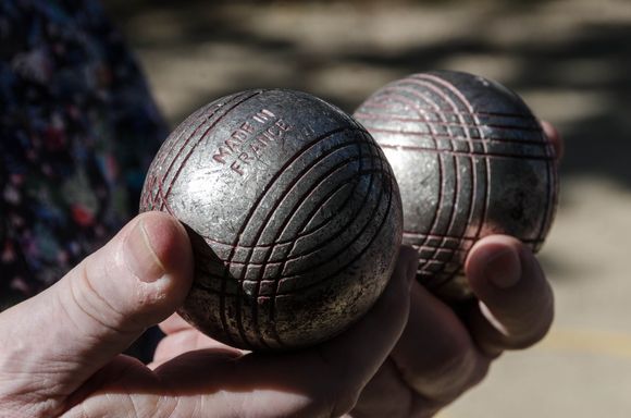 Directly across the Port de Plaisance from our Vannes rental house, were a pair of adjoined petanque terrains.