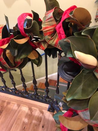 
Magnolia garlands on stair railing
