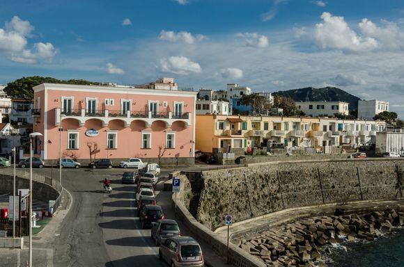 The previous shot showed the spiaggia at Sant Angelo. Above is the isle's largest village, Forio. Its motif is the whitewashed Chiesa del Soccorso. There is an excellent cafe located right by the parking lot between that iconic church and the Municipo. Ischia has 103 thermal springs, 95 thermal spas plus 67 fumaroles, and busy Forio has many of those amidst its outskirts. 