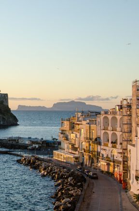 Capri can be seen here in the distance, sandwiched visually between Ponte and the Castle. It is much more expensive than Ischia. *Incidentally, a WWII tragedy occurred in this vicinity during 1943. RAF bombers needlessly sank the postal ship St. Lucia just off the local islet of Ventotene. The death toll was 120 innocent civilians killed.