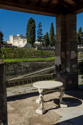 The Antiquarium of Herculaneum is framed by the room with a white marble table. A few such tables can be found throughout the site. Numerous Herculaneum relics are considered to be better-preserved than most found in Pompeii. There wooden bed frames, window frames, room dividers, two-story taverns and more.
*Next: Ravello