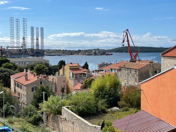 Pula harbor in the distance