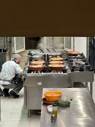 Kitchen with brodetto in terra cotta vessels