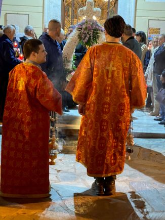Incense bearers at the head of the procession. They stood like this for about 10 minutes while the priests were chanting. You can see the epitaph, or "coffin" between the incense bearers. 
