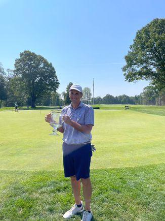 Sandy with his trophy. 