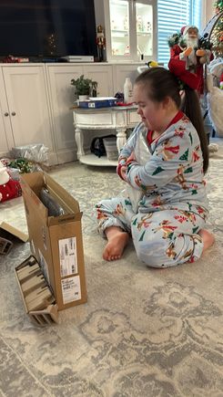 Her hugging her laptop because she was so excited