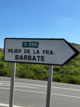 Entrance to main road, from unpaved lane that leads to my tucked-away, country hotel.   