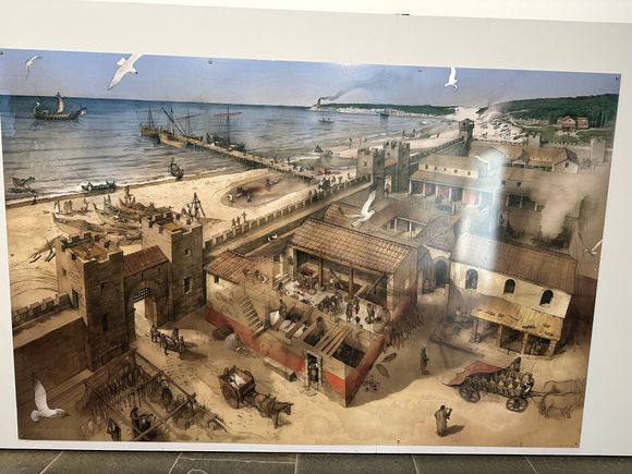 The tuna and salt enter the settlement, separately, through the gate, and proceed to the garum "factory."