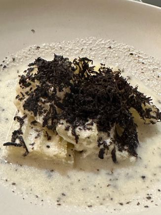 This is a Lucious concoction of cardoons simmered in almond milk (fresh almond milk!) and showered with black truffles....light and lovely and supremely tasty.