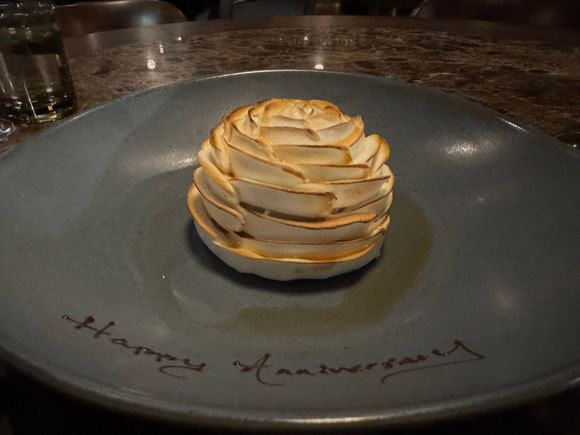 And our delicious Bombe Alaska . . . set on fire with liquor!