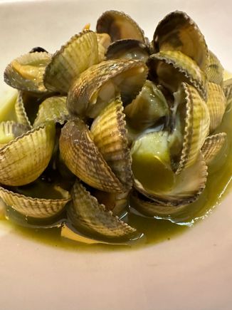 Berberechos in salsa encurtido...at LUME..smashingly great.
Media ración:  11.75 euro....  Next time I ought to get two full orders; just think of all that sauce I can drink after the clams have been devoured.   What a great restaurant!
