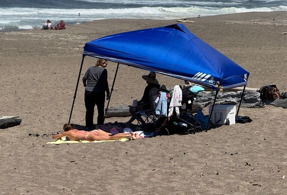 It was 63° and the wind was blowing a steady 10 to 15 mph! The rest of us had jackets on, lol!