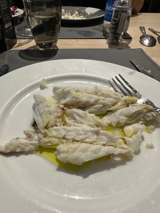 Spigola cooked in a salt crust, after waiter broke the crust and filleted the fish
