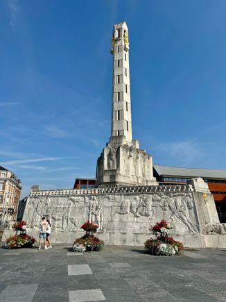 The peace monument outside the train station. It was erected in memory of the war victims of World War I in 1925 to commemorate the 200 civilians who were shot there by the Germans in 1914. It also commemorated the destruction of the city center. But it was destroyed by German occupiers during the second world war and was only recently restored in 2004.