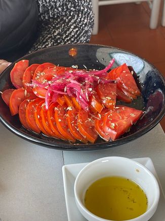 Beware of Portuguese portions--our tomato salad at Atira-te-ao-rio that would feed 4--best tomatoes ever!