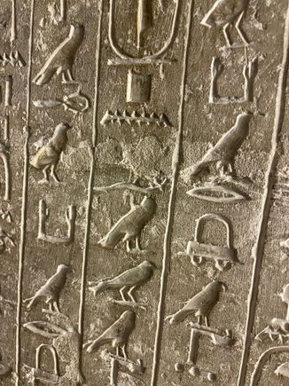 Text on pyramid wall
