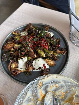 Roasted brussel sprouts, coriander seeds,barberries and garlic yogurt