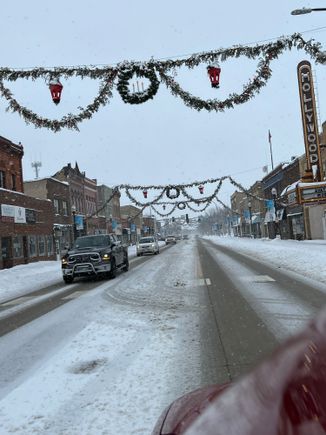 our towns xmas decorations. The 'bras' have been put up for over 75 years in a row. Does the left one look a little bigger than the right one to anyone else?