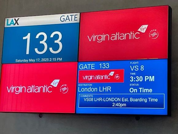 Our Mystery Tour starts on Virgin. Atlantic.  We have opted for Virgin's Economy Delight class, which is essentially Economy and then a flight attendant comes by every hour and says, "How delightful", but it is in a crisp English accent to it is...delightful