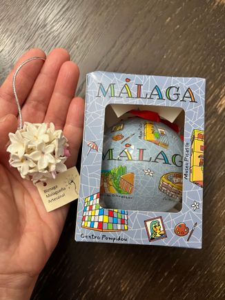Our "official" souvenirs from our trip: a Malaga ornament and a porcelain Biznaga ornament