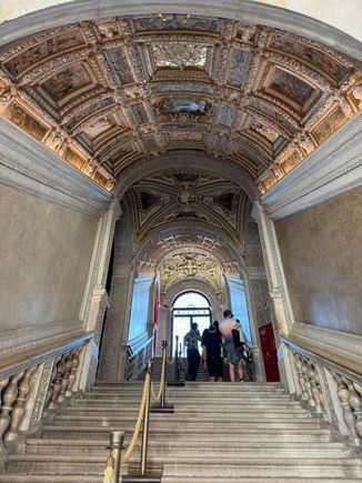 The Golden Staircase with its 24-karat gilded ceiling