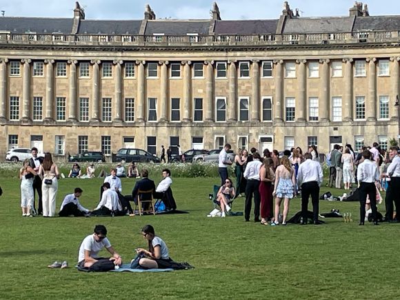 Out in front of the Royal Crescent.  This picture does not do this scene justice.  All of these students descend on the park, I believe for pictures. You can see some tuxes and dresses here.  If I would have waited an hour, you would not have been able to see the grass because it was so covered with students.