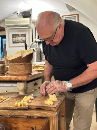 Libero Scozzari, who runs the place with his wife.  Like just about every other diner at both meals, he was wearing sneakers.   I've decided that it's not necessary to take any footwear other than a pair of sneakers on a trip to Puglia.  In the entire region, there is no restaurant that requires dressing up.
